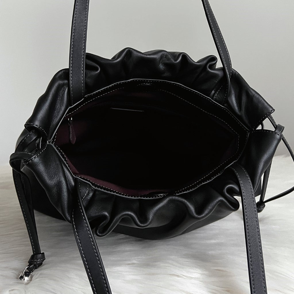 Coach Black Leather Front Logo Drawstring Shoulder Bag Like New