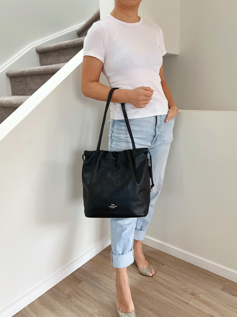 Coach Black Leather Front Logo Drawstring Shoulder Bag Like New