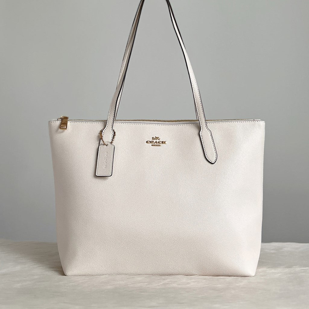 White Leather Tote Bag selling with Key emblem on front