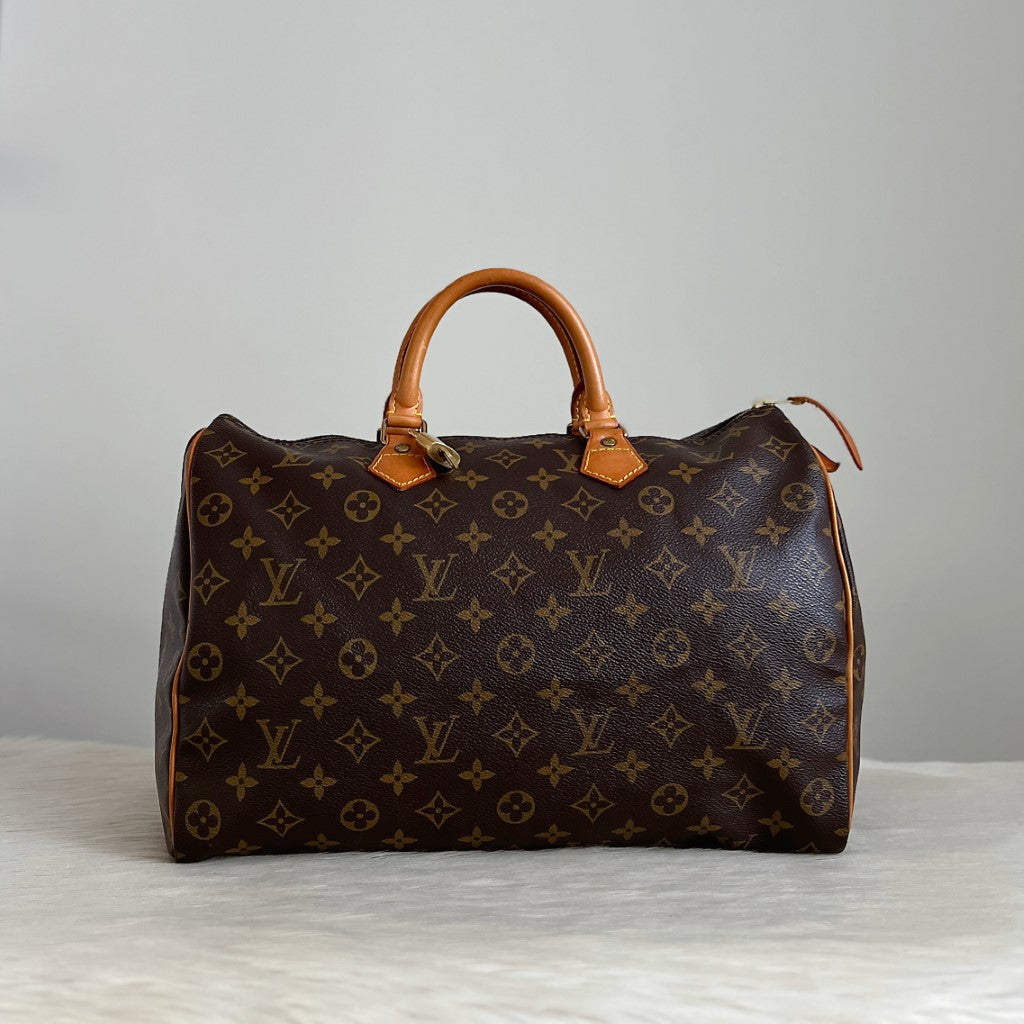 Louis Vuitton Signature Monogram Speedy 35 Bag + Lock & Keys