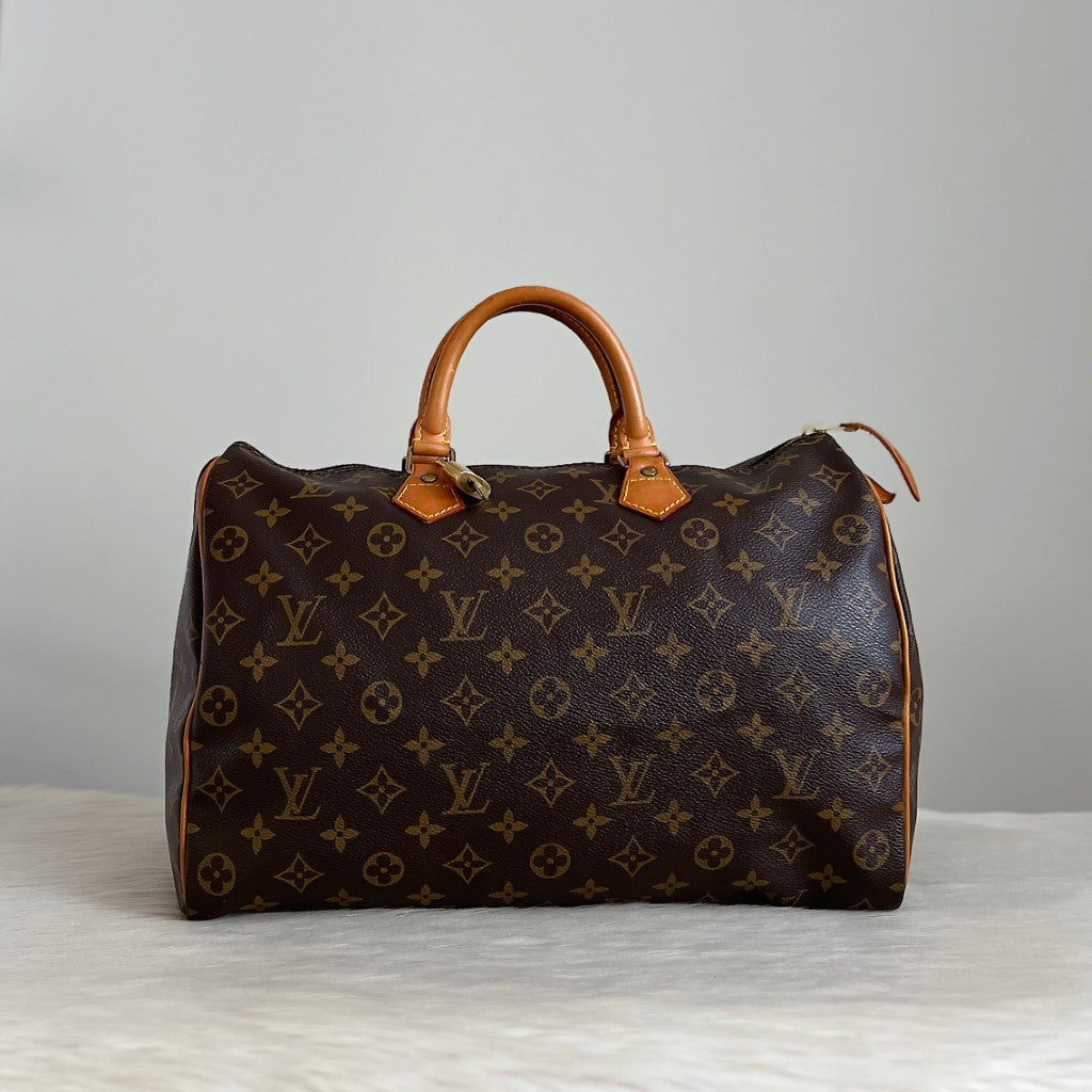 Louis Vuitton Signature Monogram Speedy 35 Bag + Lock & Keys