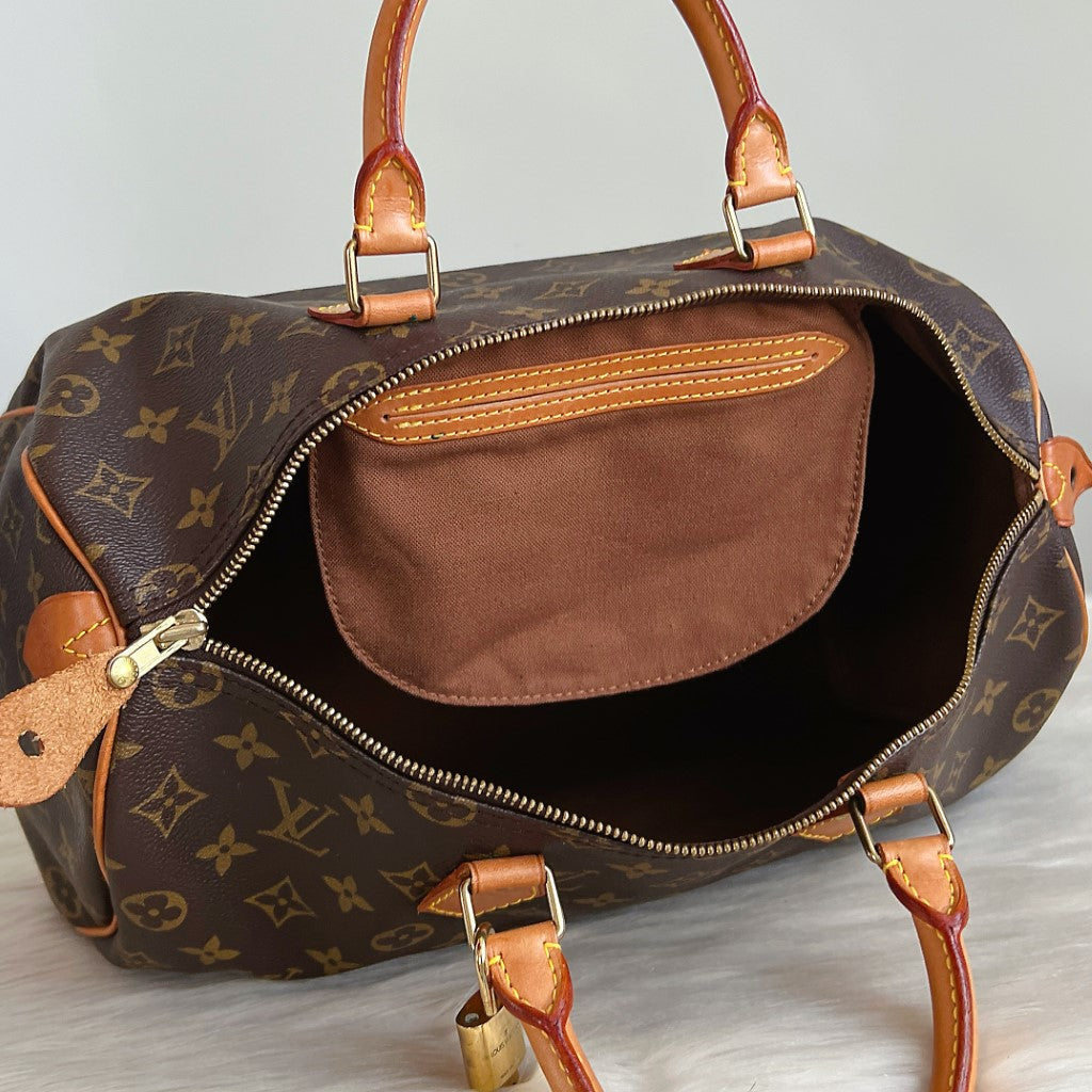 Louis Vuitton Signature Monogram Speedy 35 Bag + Lock & Keys