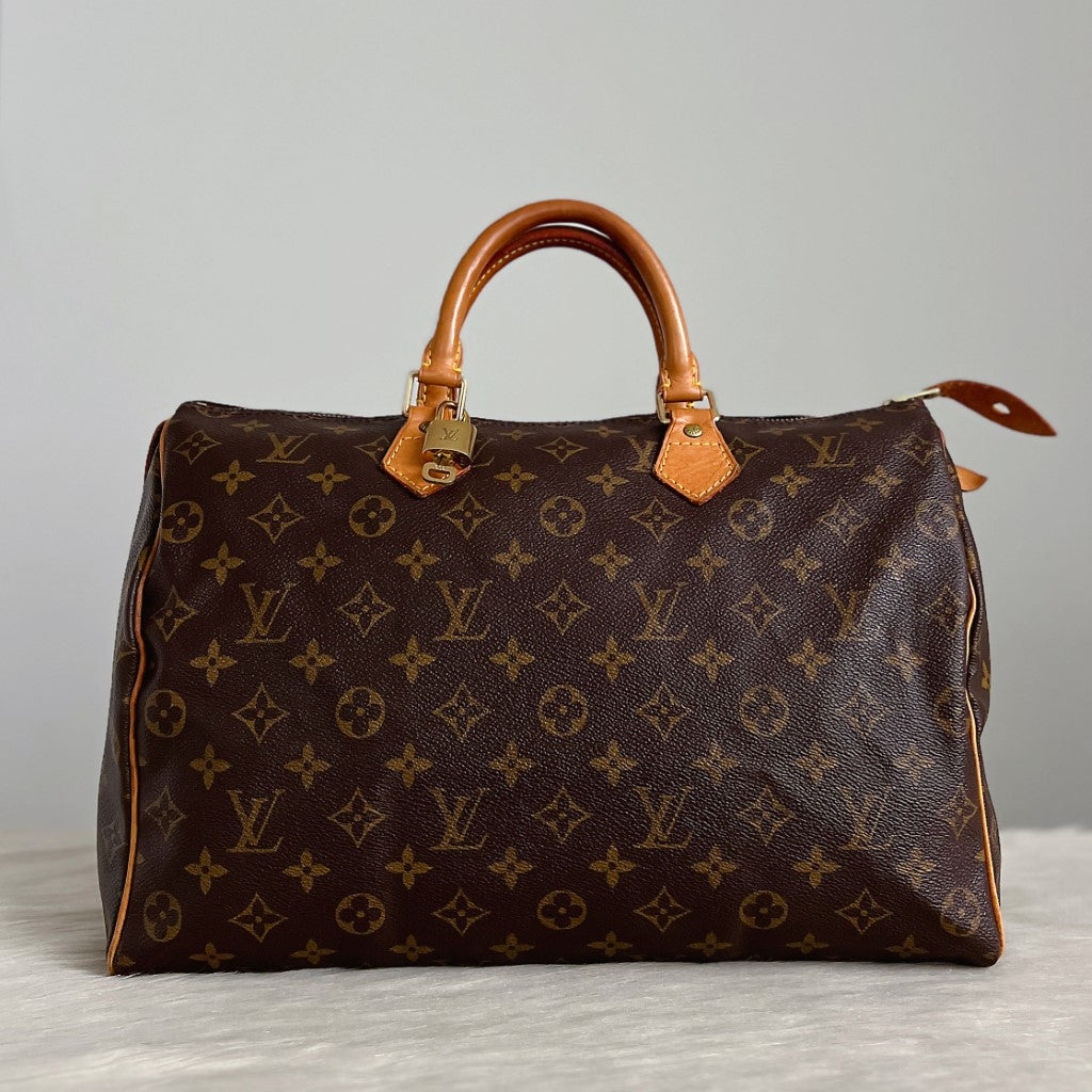 Louis Vuitton Signature Monogram Speedy 35 Bag + Lock & Keys