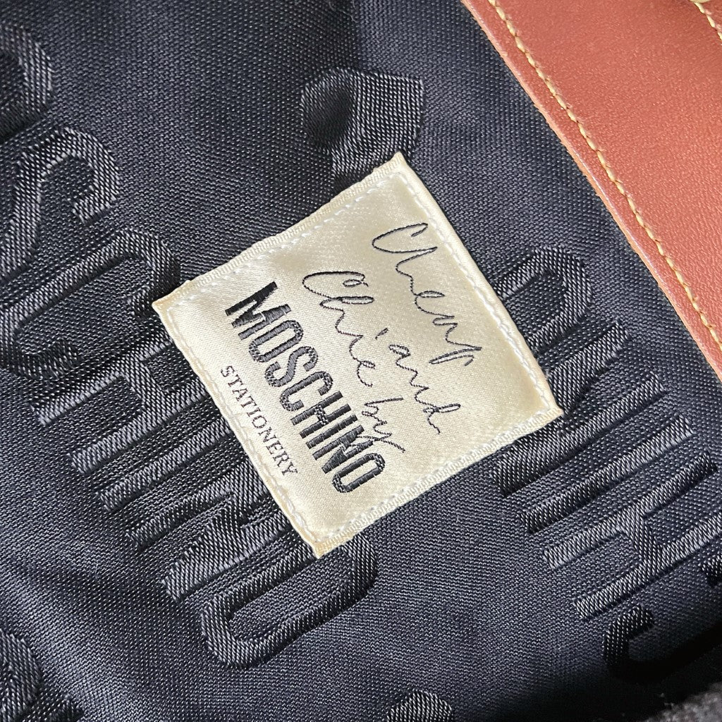 Moschino Two Tone Flap Buckle Drawstring Backpack Excellent