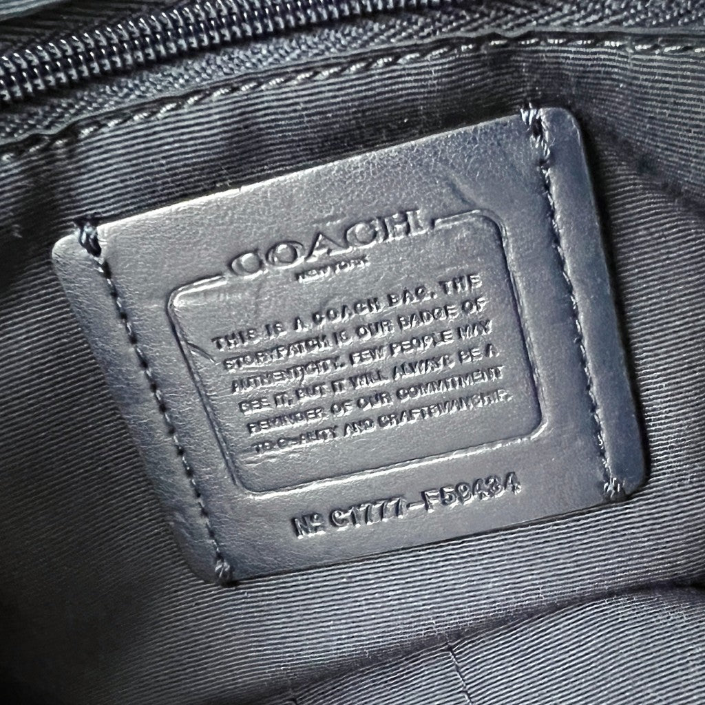 Coach Navy Leather Floral Print Drawstring Backpack Excellent