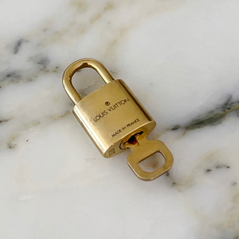 Louis Vuitton Gold Tone Padlock and Key Set Excellent
