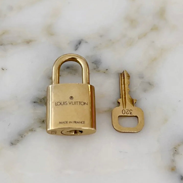 Louis Vuitton Gold Tone Padlock and Key Set Excellent