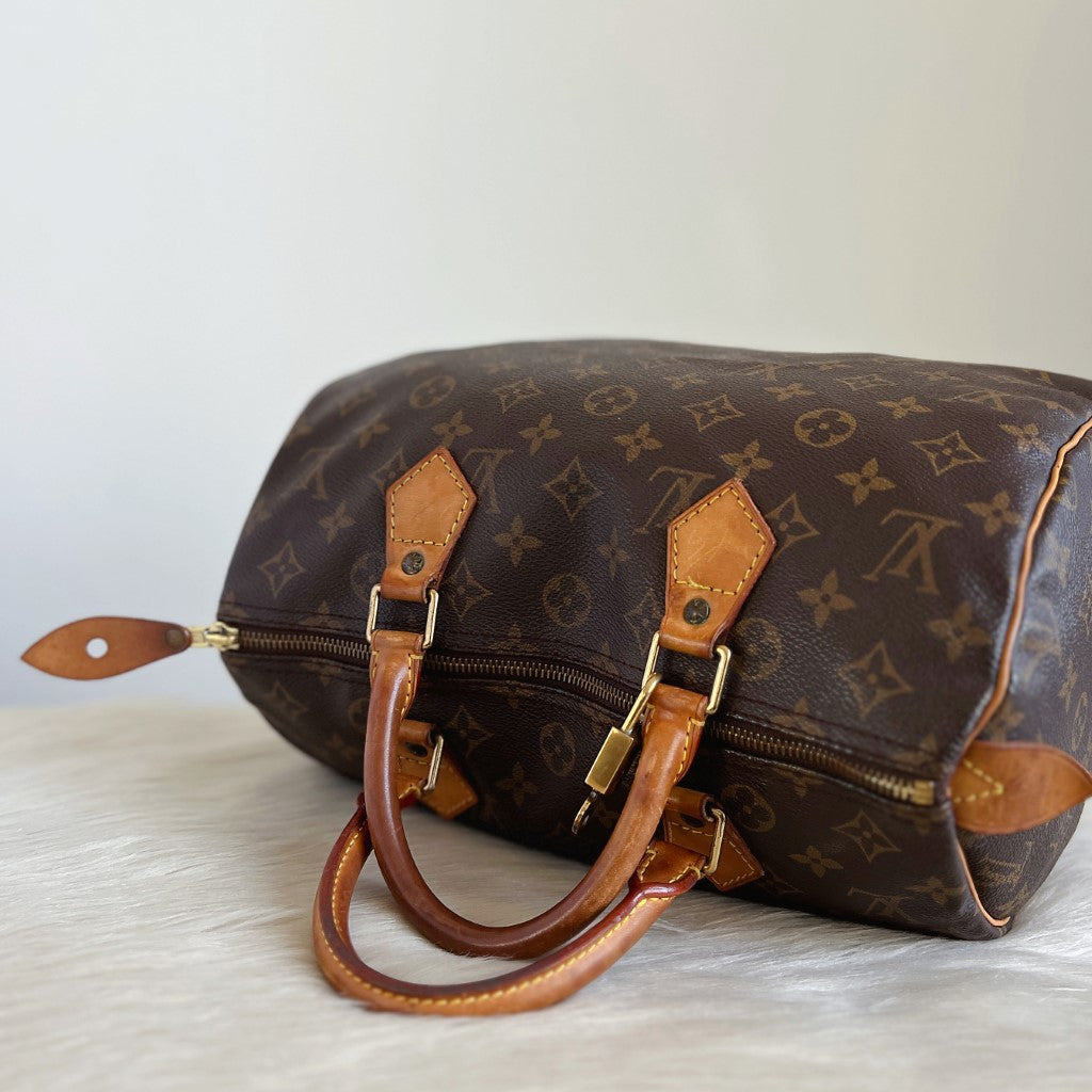 Louis Vuitton Signature Monogram Speedy 30 Bag + Lock & Keys