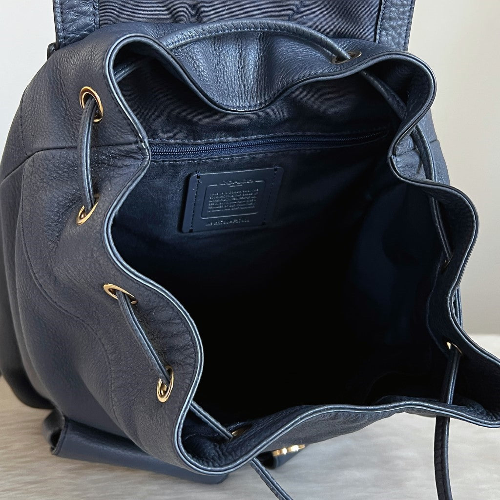 Coach Navy Leather Turn Lock Pocket Drawstring Backpack Like New