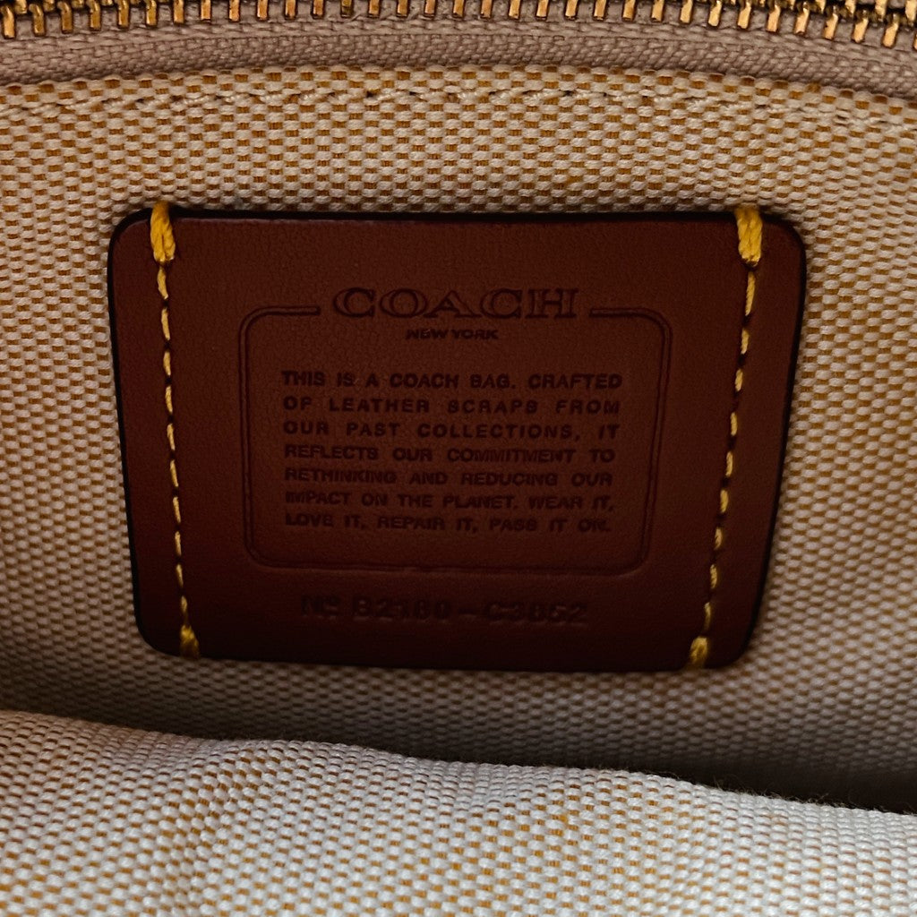 Coach Beige Leather Woven Drawstring Bucket 2 Way Shoulder Bag Excellent