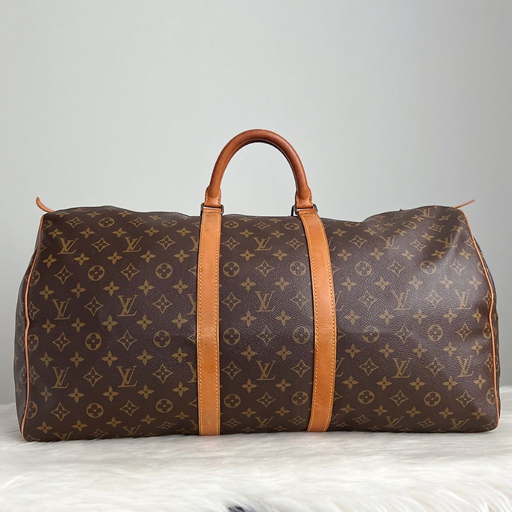 Louis Vuitton Signature Monogram Keepall 55 Travel Bag