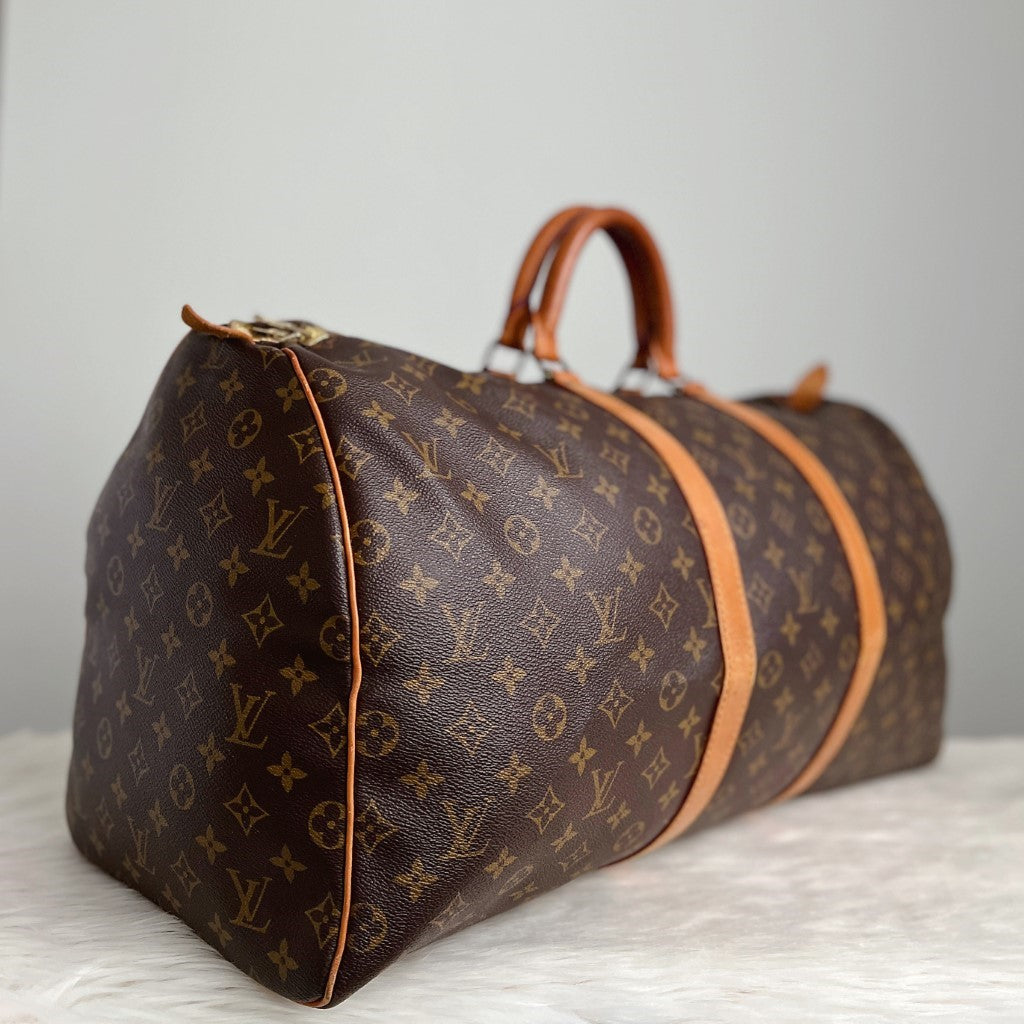 Louis Vuitton Signature Monogram Keepall 55 Travel Bag