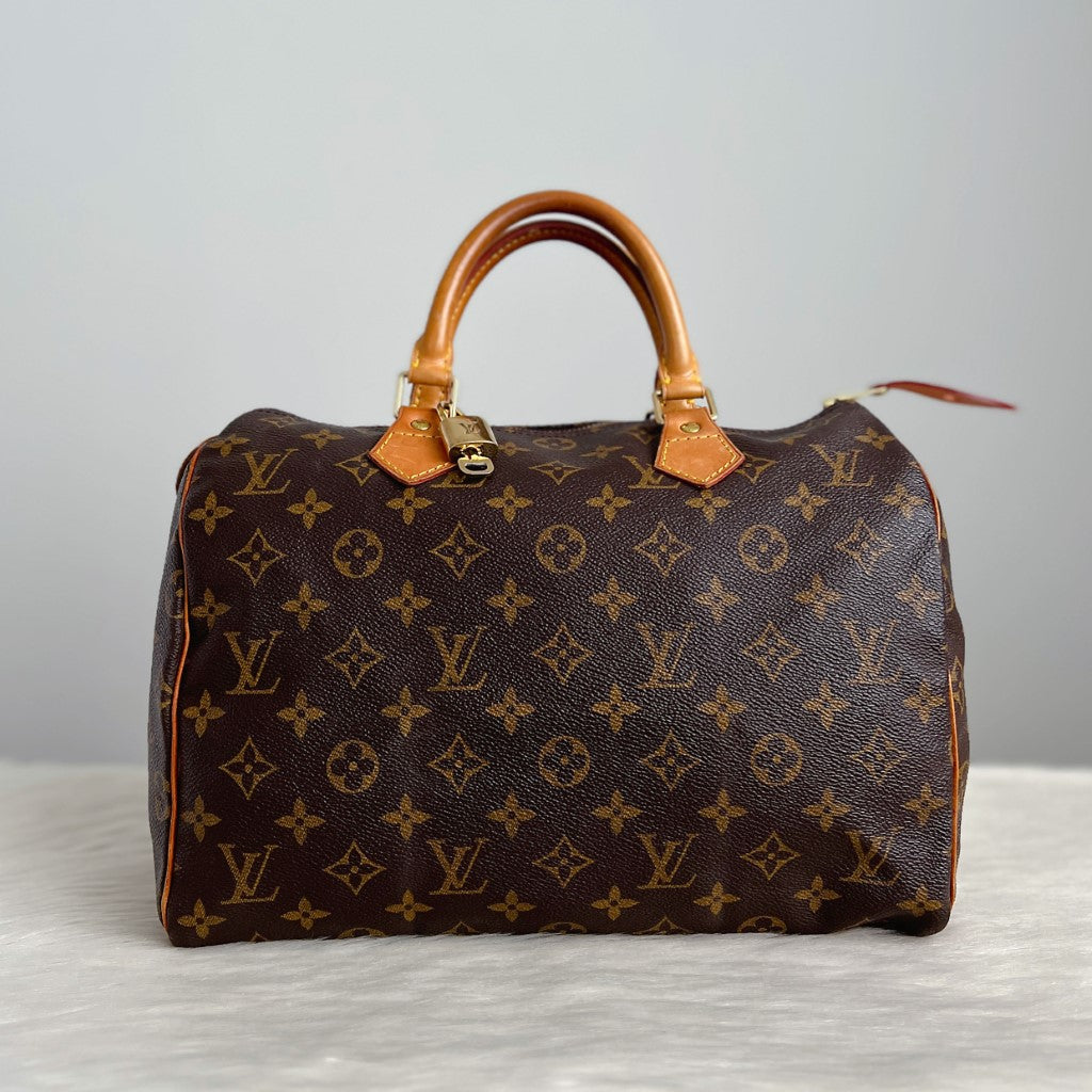 Louis Vuitton Signature Monogram Speedy 30 Bag + Lock & Keys