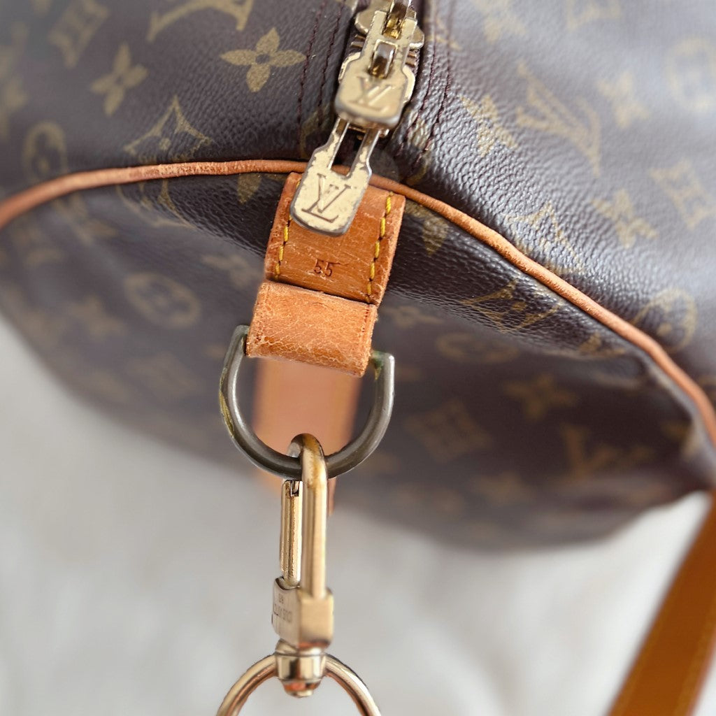 Louis Vuitton Signature Monogram Bandouliere Keepall 55 Travel Bag