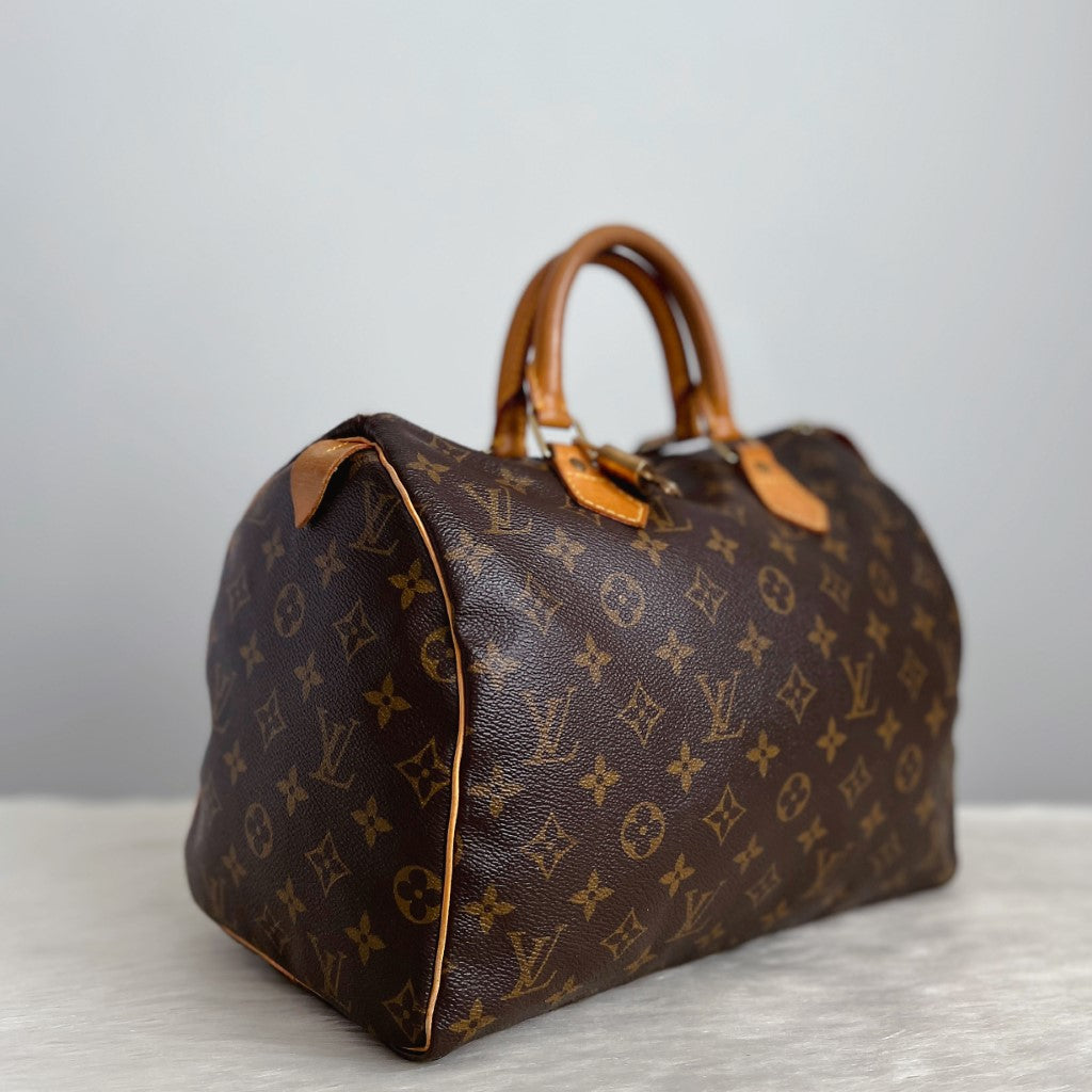 Louis Vuitton Signature Monogram Speedy 30 Bag + Lock & Keys