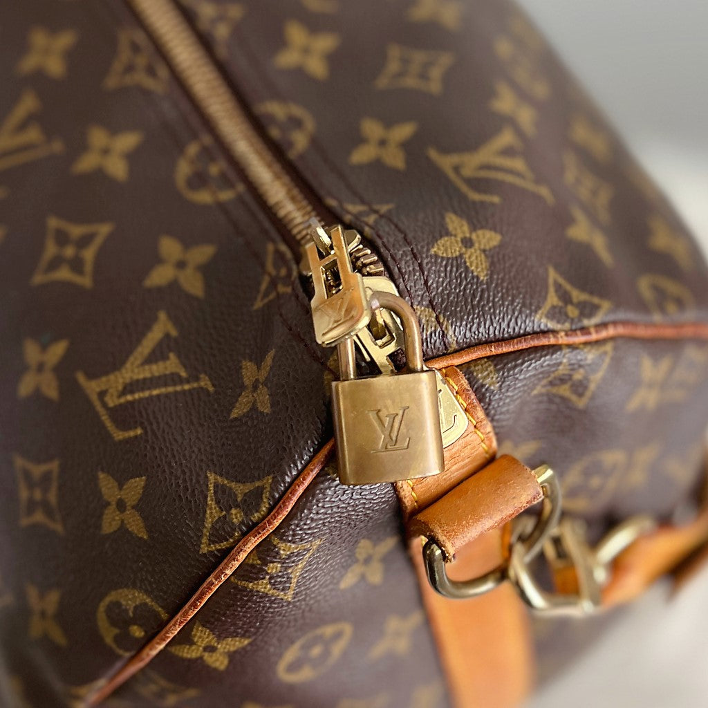 Louis Vuitton Signature Monogram Bandouliere Keepall 55 Travel Bag