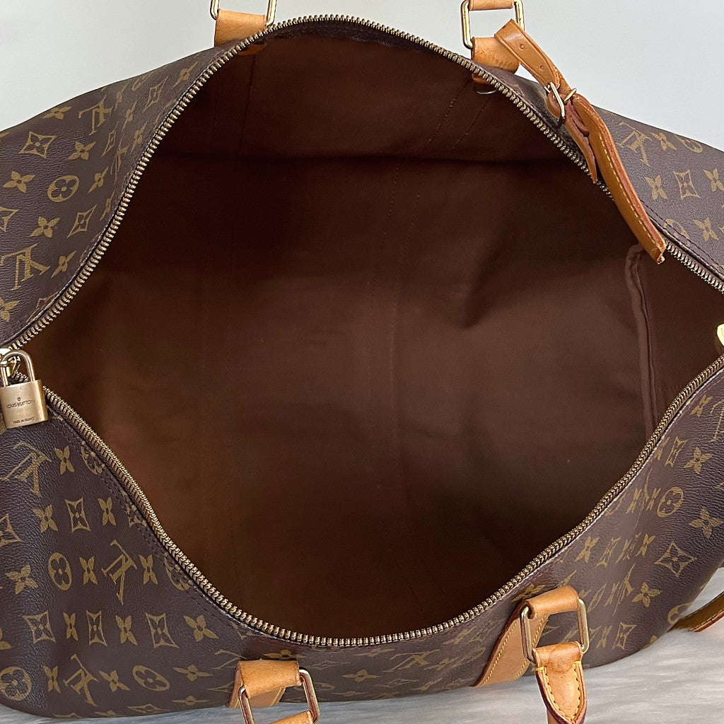 Louis Vuitton Signature Monogram Bandouliere Keepall 55 Travel Bag