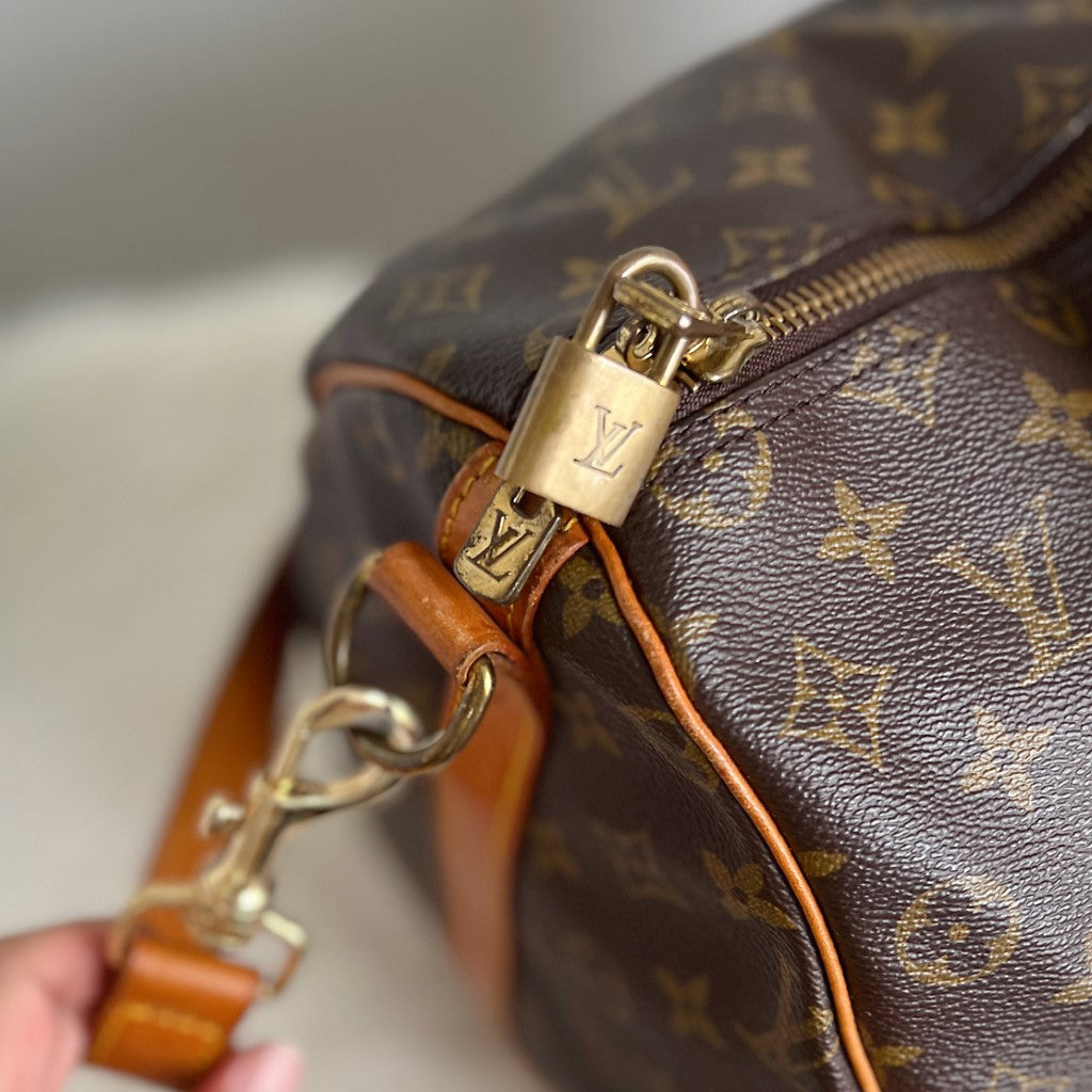 Louis Vuitton Signature Monogram Bandouliere Keepall 50 Travel Bag