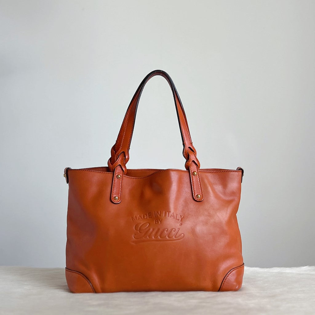 Gucci Orange Leather Embossed Logo Shoulder Bag