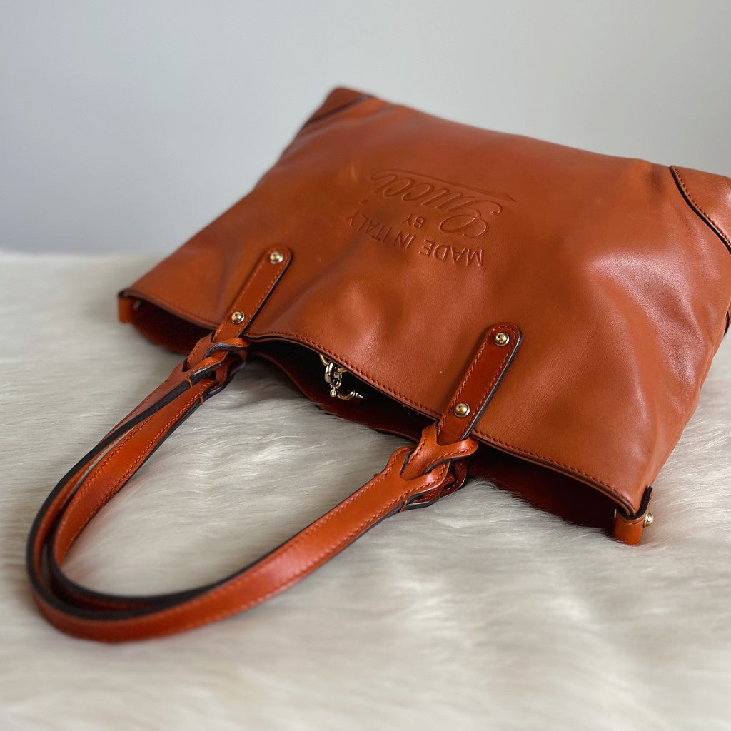 Gucci Orange Leather Embossed Logo Shoulder Bag