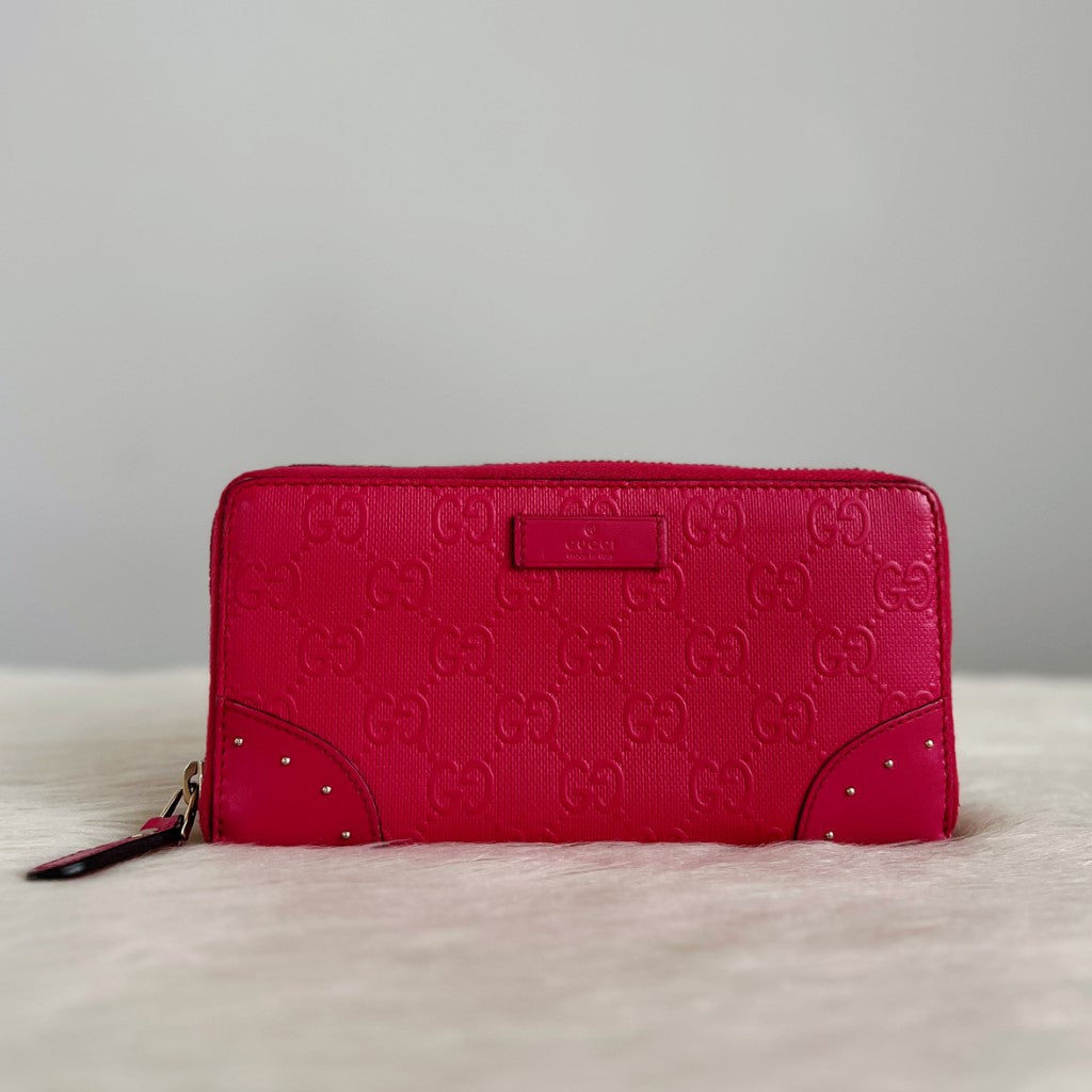 Gucci Fuchsia Leather Embossed GG Logo Zip Compartment Long Wallet Excellent