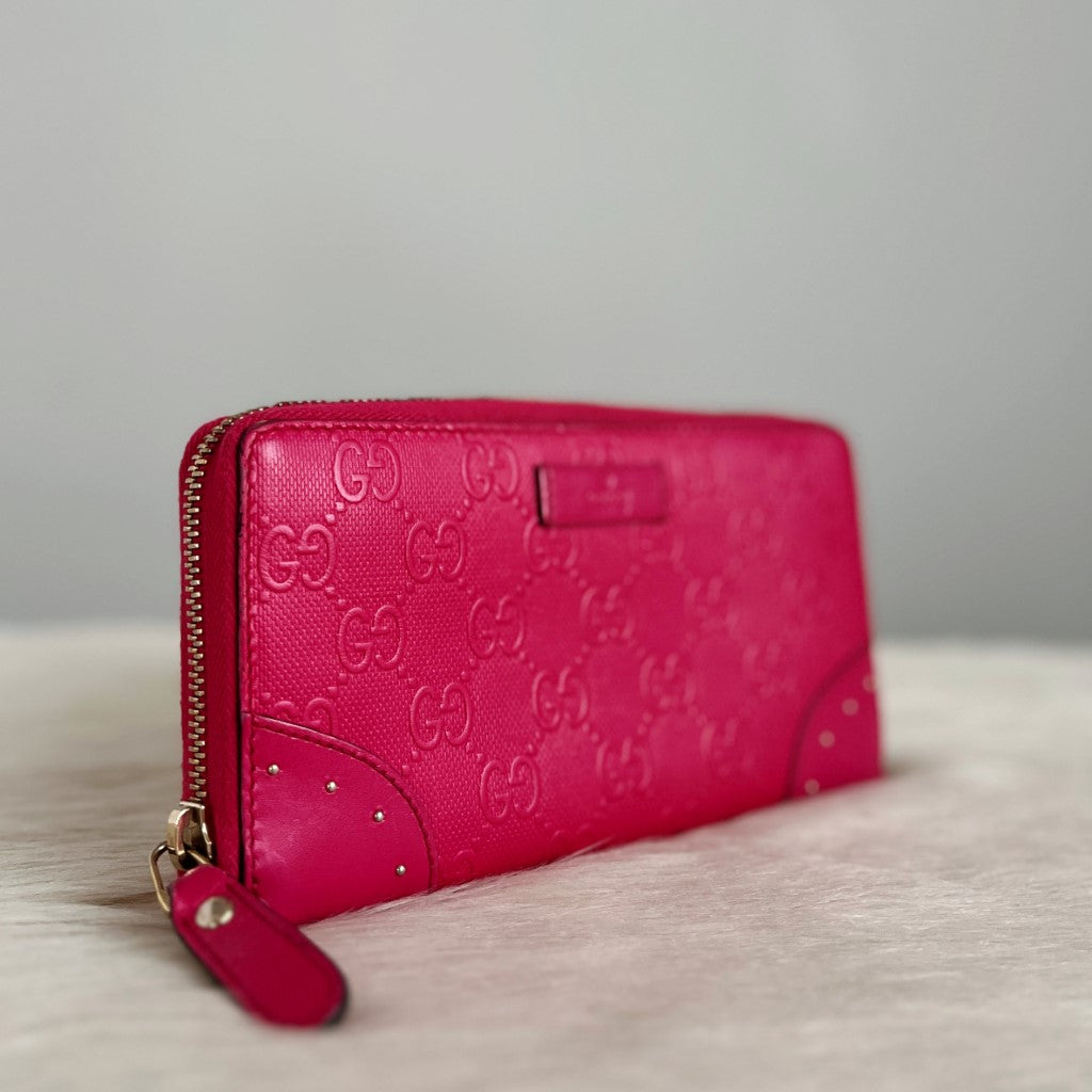 Gucci Fuchsia Leather Embossed GG Logo Zip Compartment Long Wallet Excellent