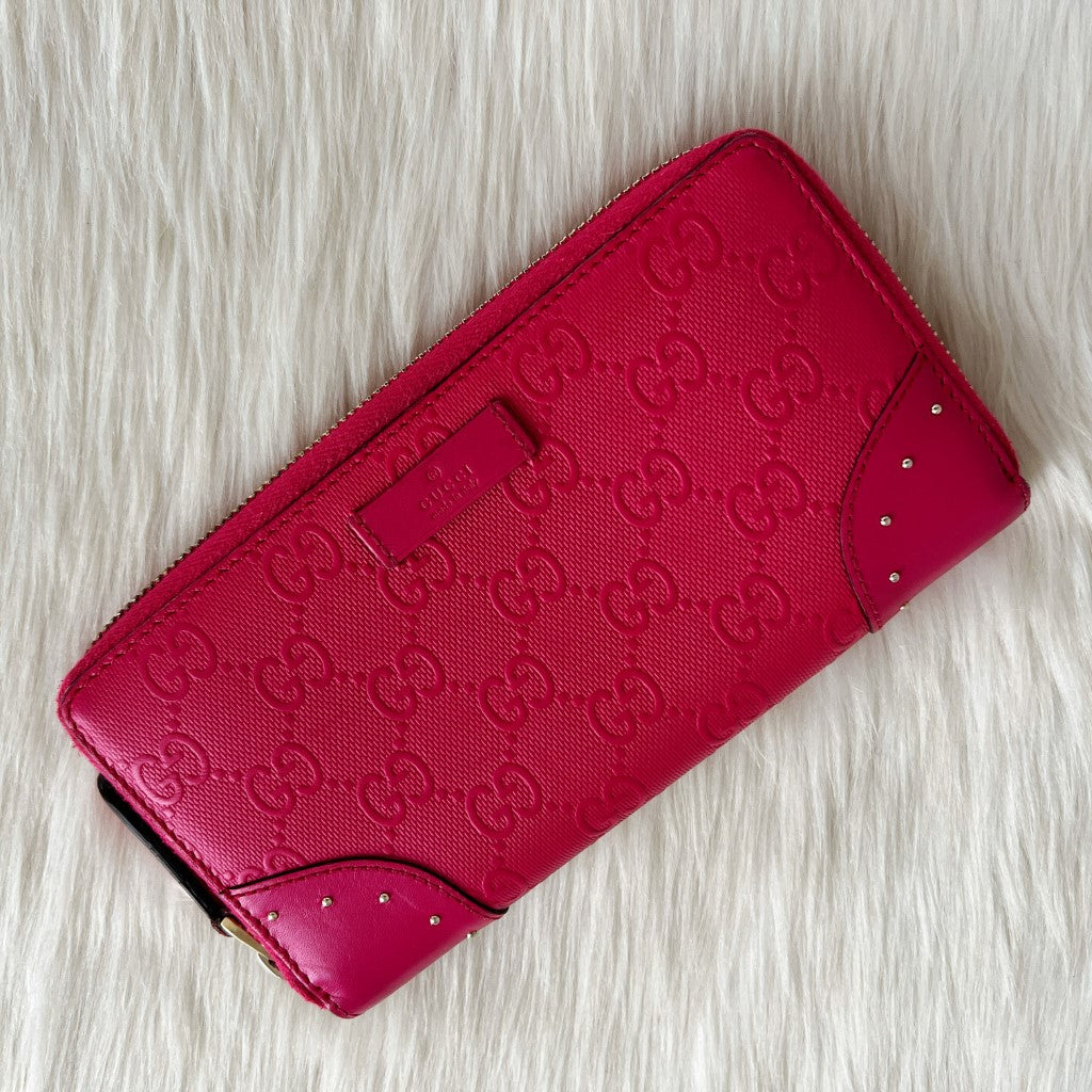 Gucci Fuchsia Leather Embossed GG Logo Zip Compartment Long Wallet Excellent