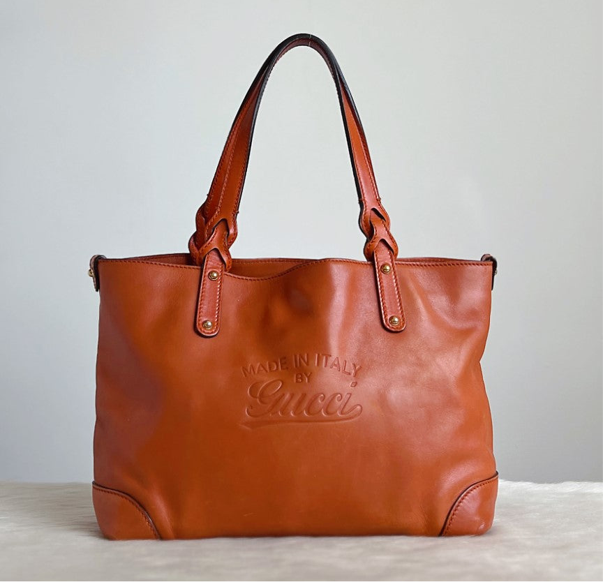 Gucci Orange Leather Embossed Logo Shoulder Bag