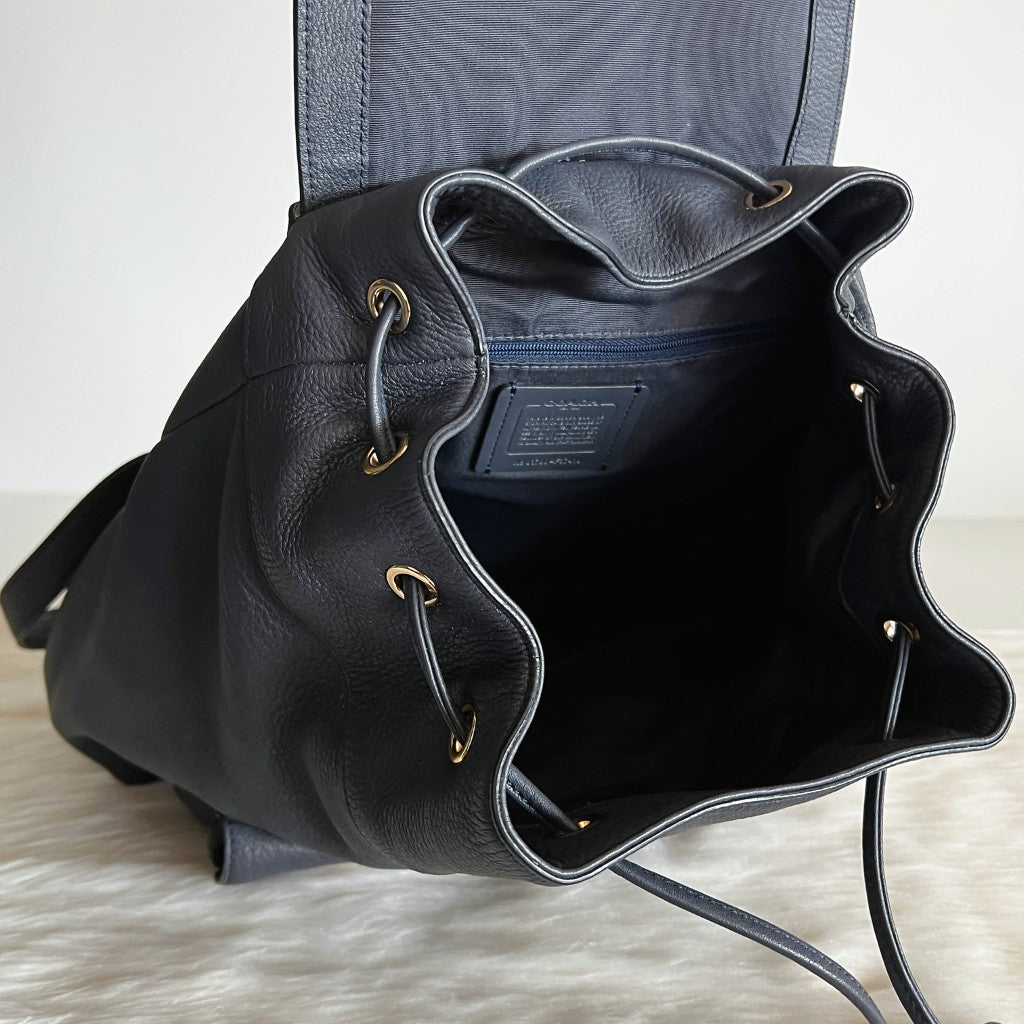 Coach Navy Leather Front Logo Drawstring Turn Lock Pocket Backpack Like New
