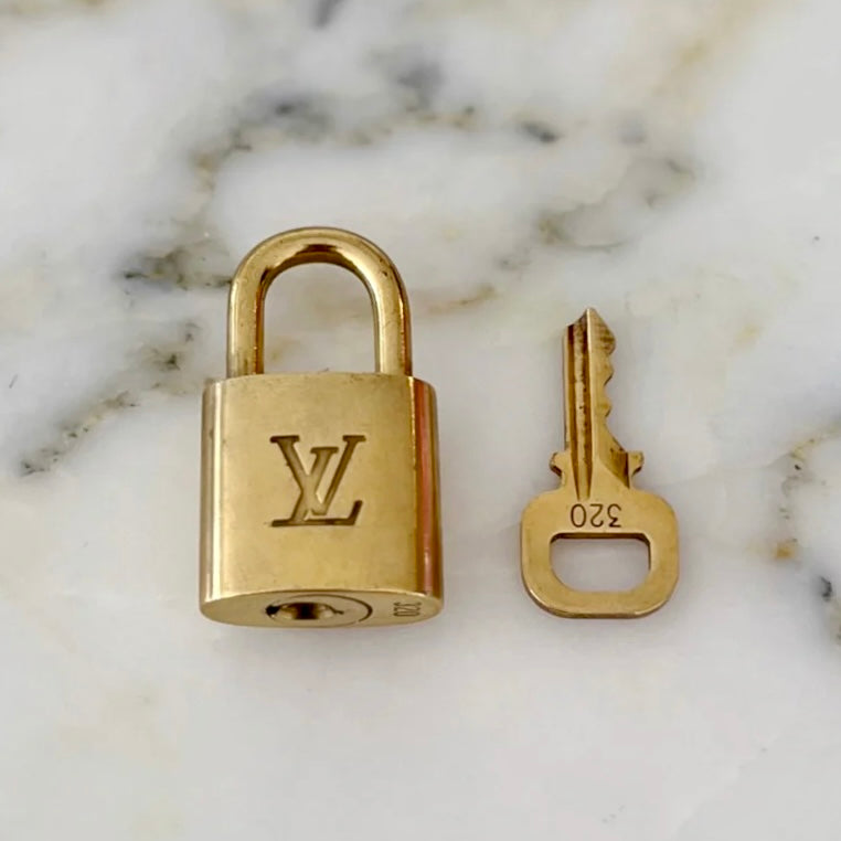 Louis Vuitton Gold Tone Padlock and Key Set Excellent