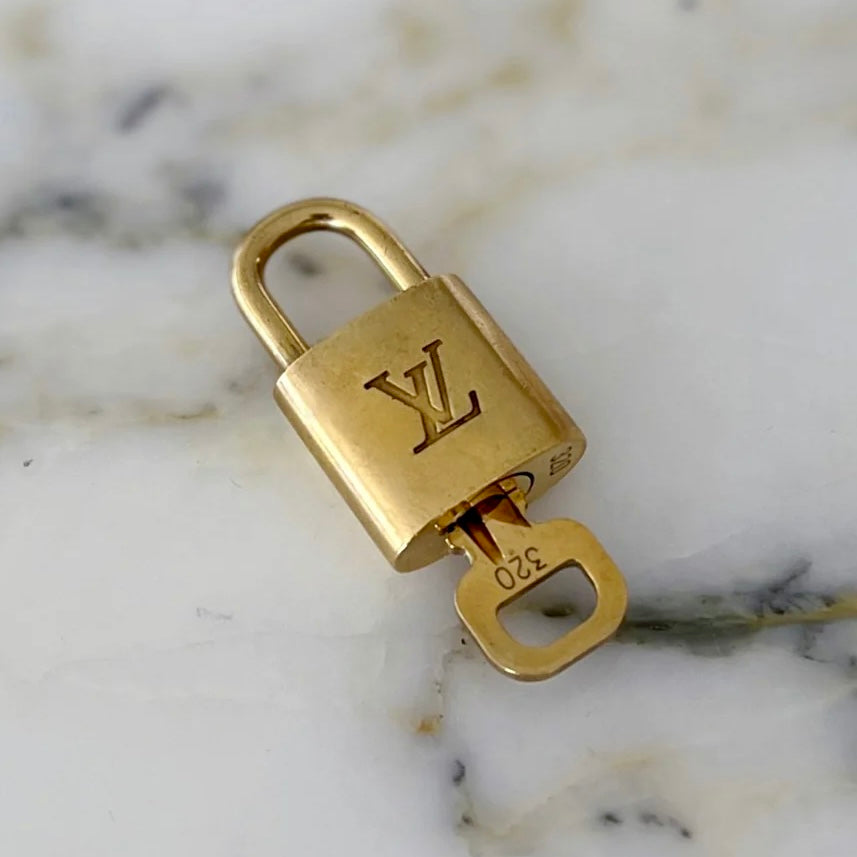 Louis Vuitton Gold Tone Padlock and Key Set Excellent