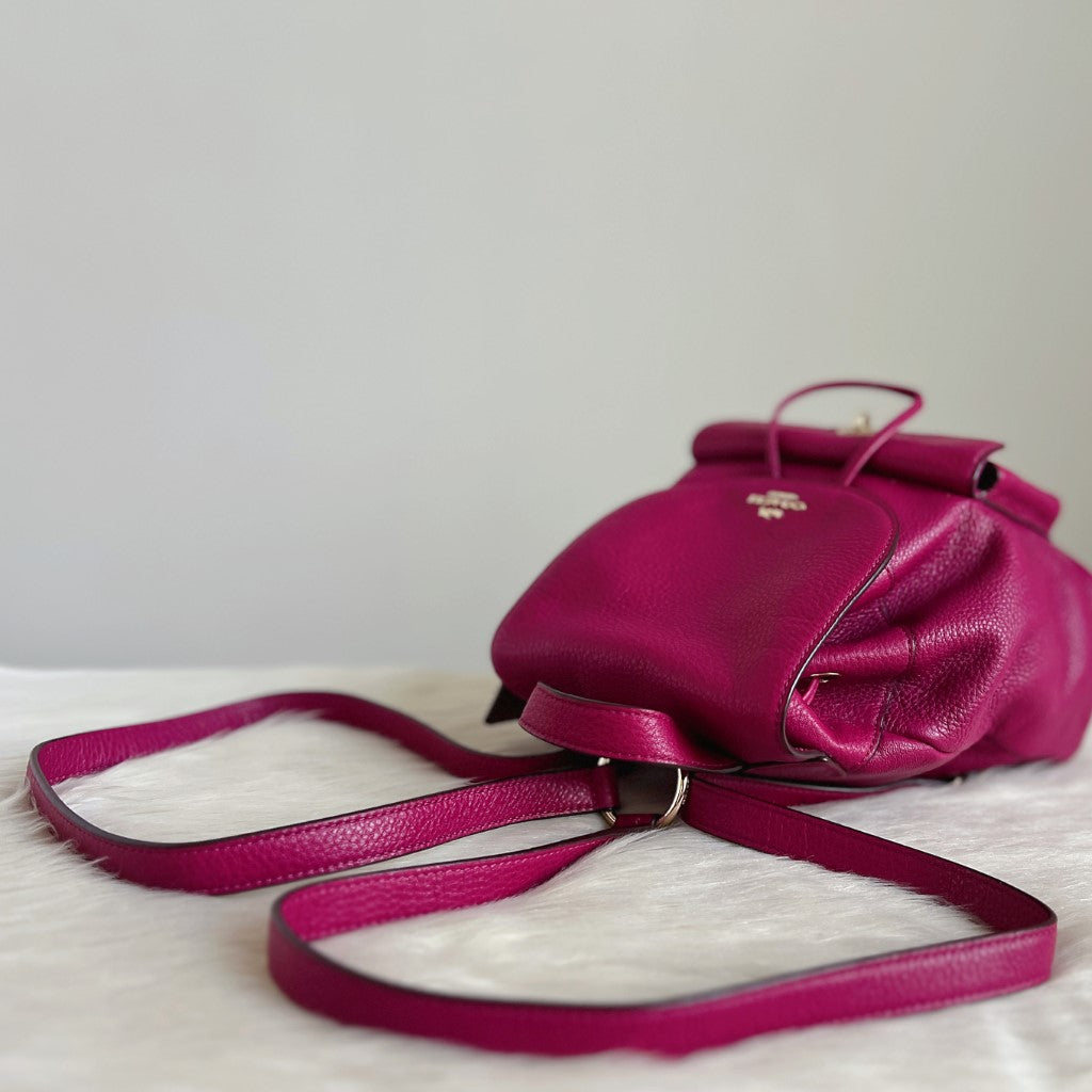 Coach Fuchsia Leather Front Logo Drawstring Mini Backpack Excellent