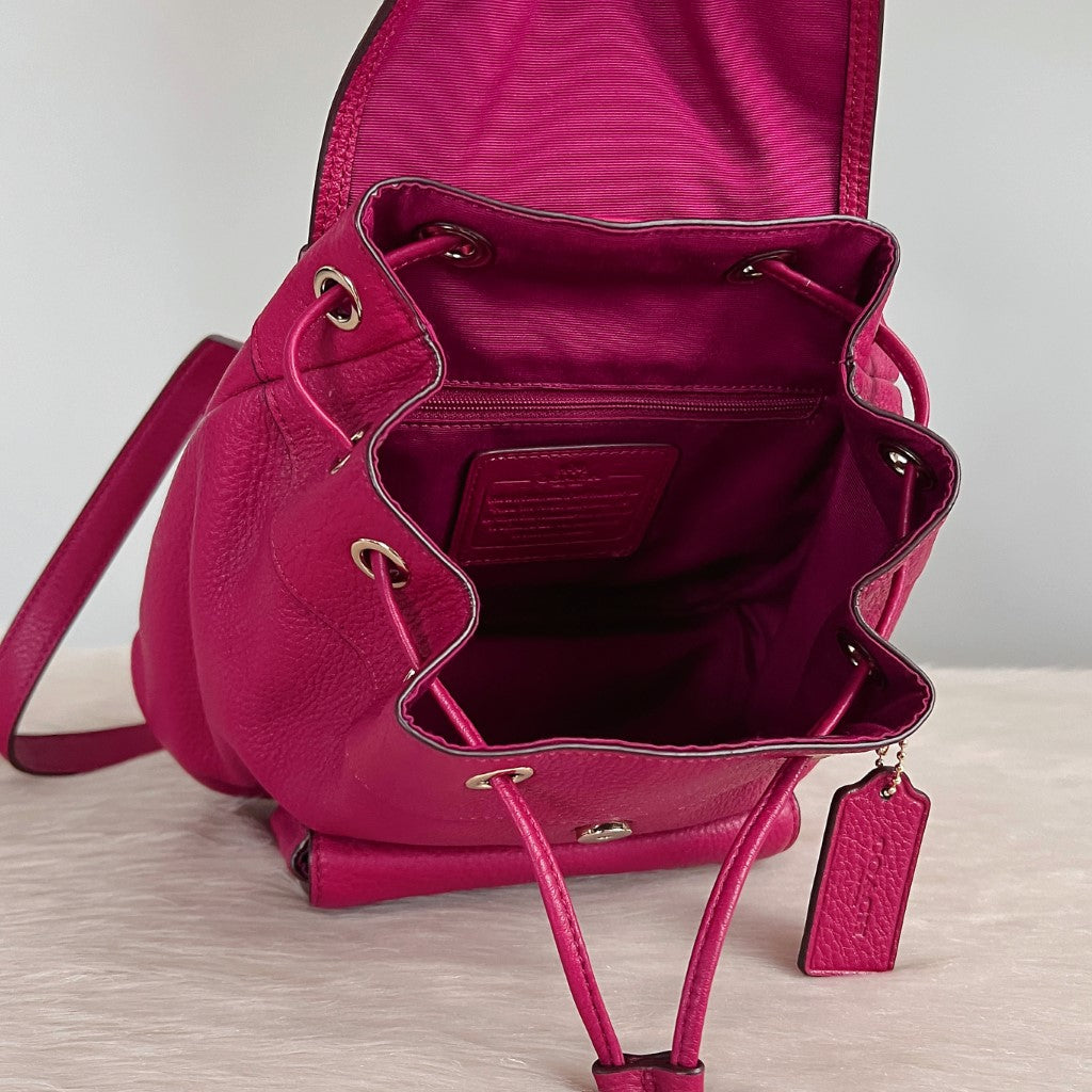 Coach Fuchsia Leather Front Logo Drawstring Mini Backpack Excellent